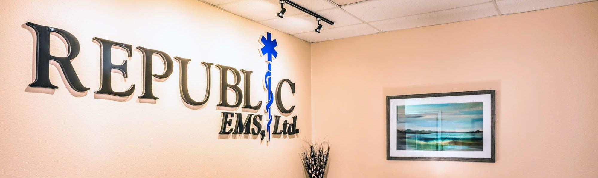 Republic EMS office lobby with the company logo on the wall